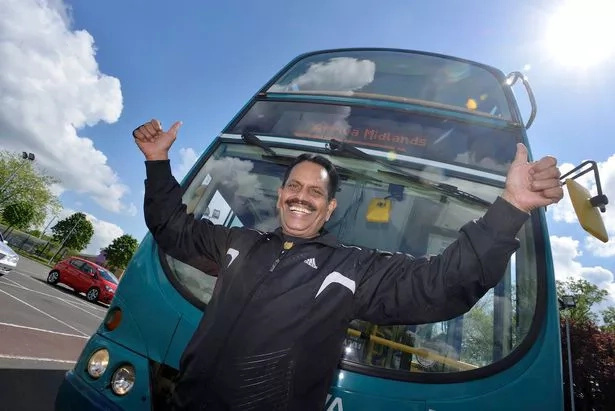 Grandad breaks own world record, pulls giant bus with ponytail