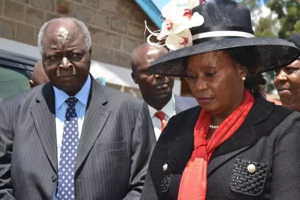 Kibaki's female companion at Nderitu Gachagua's raises eyebrows