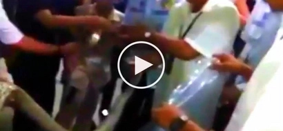 Terrified Pinoy security guards capture giant snake in SM Cebu parking lot