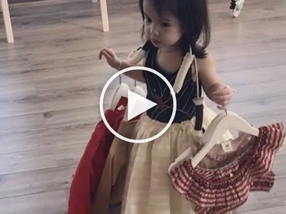 Baby Olivia’s love for clothes is revealed when she adorably shops ‘til she drops