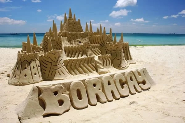 Sinira lang ang pinagpaguran! Netizens slam PNP officers for destroying 'illegal' sandcastles in Boracay Sinira lang ang pinagpaguran! Netizens slam PNP officers for destroying 'illegal' sandcastles in Boracay