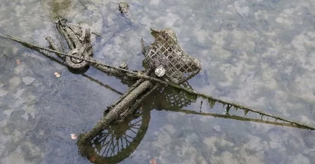 When this old canal was drained, locals were surprised to find a lot of unexpected things on the bottom. When this old canal was drained, locals were surprised to find a lot of unexpected things on the bottom.