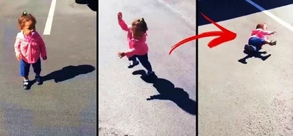 Little girl was caught on video getting scared of her own shadow. She tried to escape but she suffered an epic fail instead!