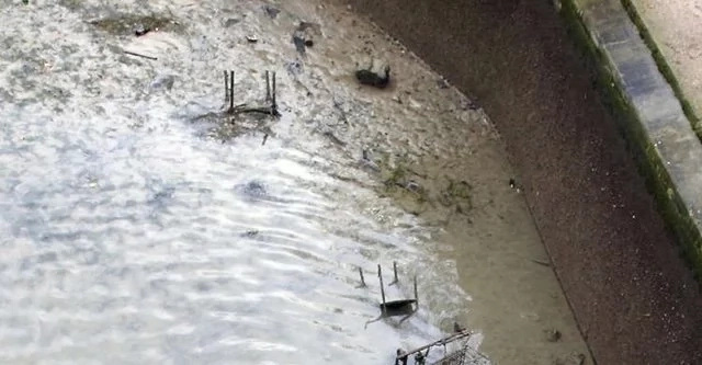 When this old canal was drained, locals were surprised to find a lot of unexpected things on the bottom. When this old canal was drained, locals were surprised to find a lot of unexpected things on the bottom.