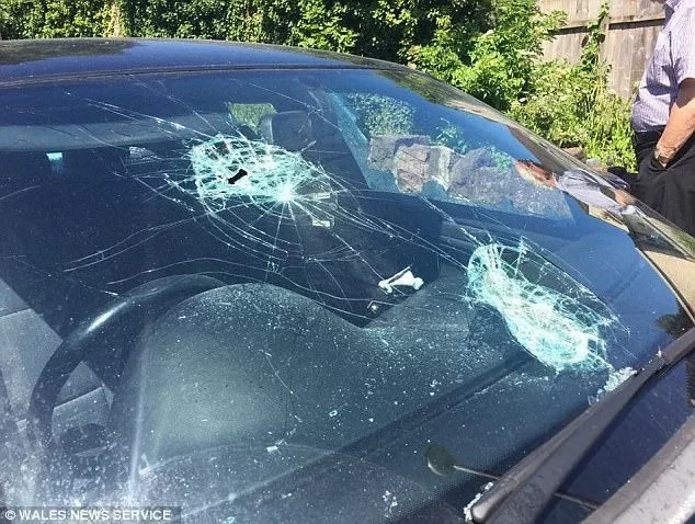 This is what you get when you cheat your girl. Woman smashed boyfriend’s BMW windscreen and windows This is what you get when you cheat your girl. Woman smashed boyfriend’s BMW windscreen and windows