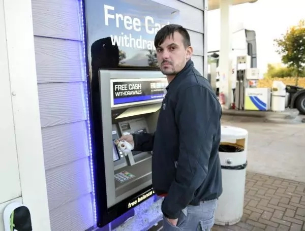 Simon was attacked while he tried to use the ATM Simon was attacked while he tried to use the ATM