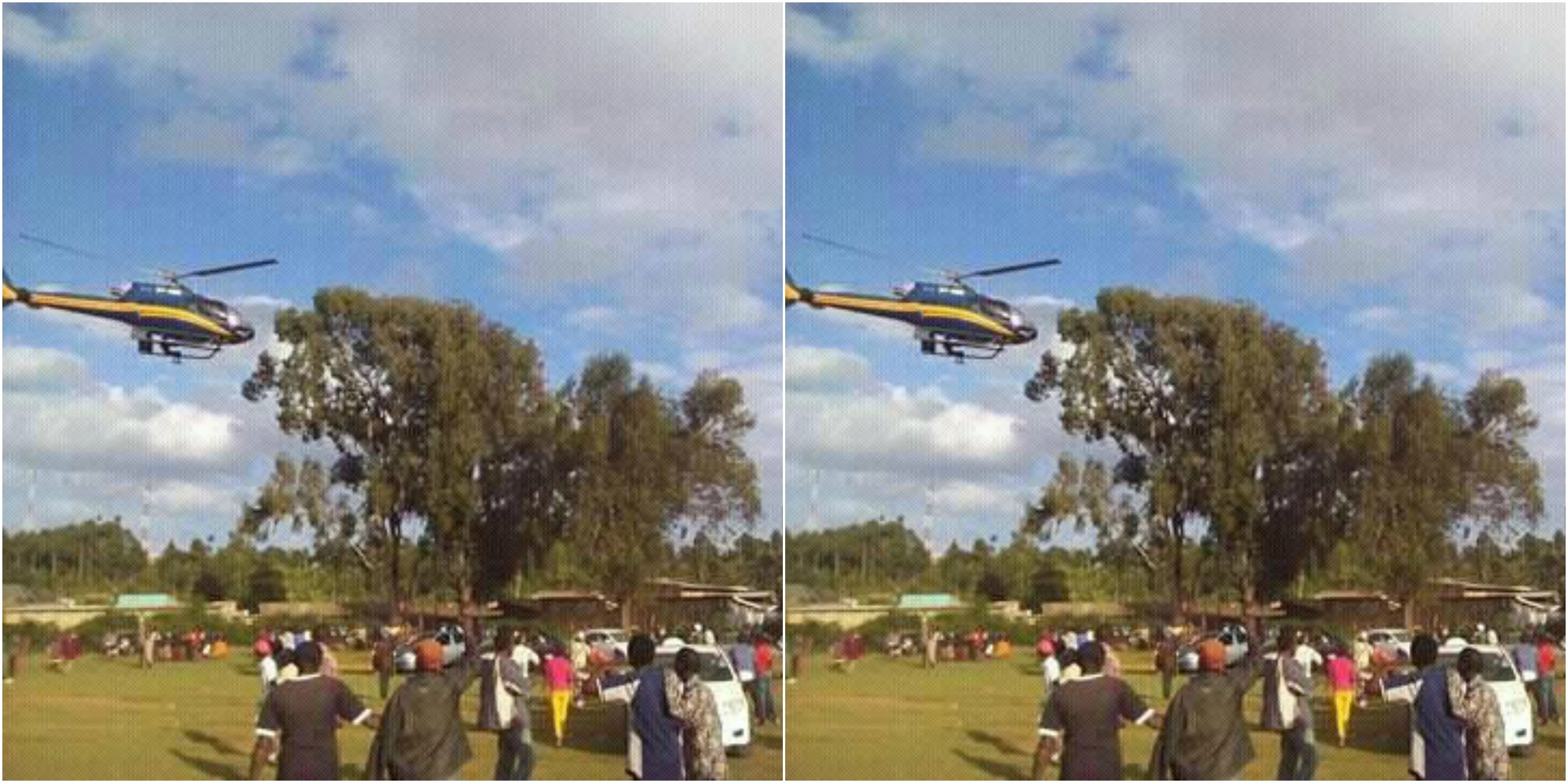 Man hangs on chopper carrying Raila Odinga
