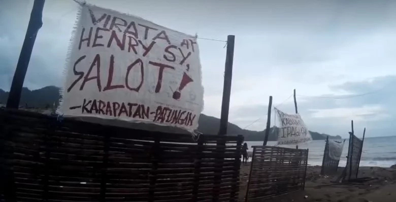 Poor fishermen use stones to defend their homes from Virata and Sy demolition forces Poor fishermen use stones to defend their homes from Virata and Sy demolition forces