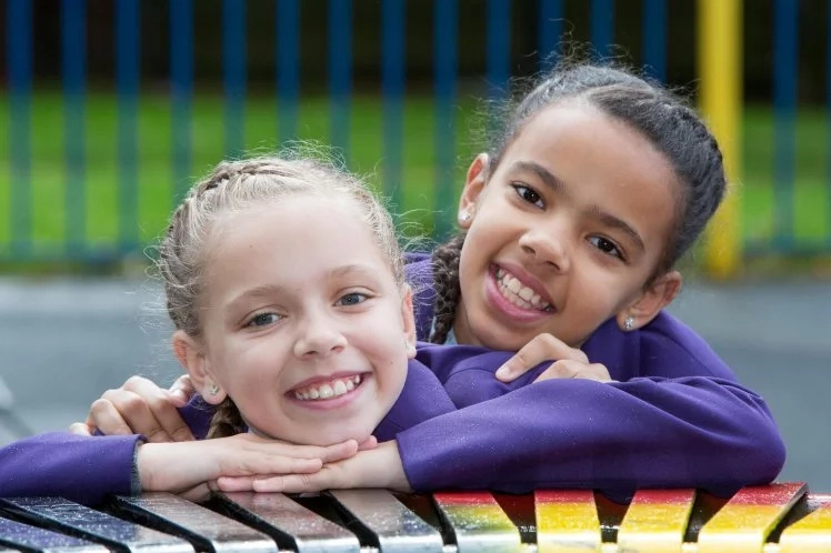 Marcia and Millie are rare black and white twins. Photo: SWNS