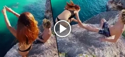 Girl lost her step on the edge of a cliff, but it's her boyfriend's reaction you want to see