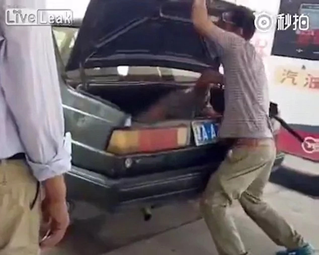 Chinese man locks his wife in car boot