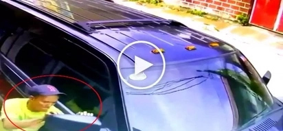 Elderly Pinoy thief caught on CCTV stealing side mirrors from parked SUV in Quezon City