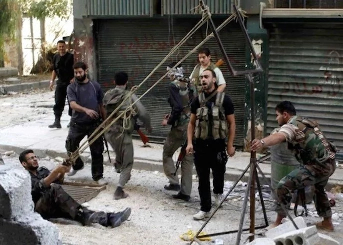 Syrian Soldier's Improvised Weapons Are Straight Out Of Mad Max Syrian Soldier's Improvised Weapons Are Straight Out Of Mad Max