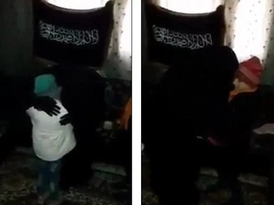 Heartbreaking! Jihadi Parents Hug and Kiss Their 7-year-old Daughter before Sending Her Off as a Bomber