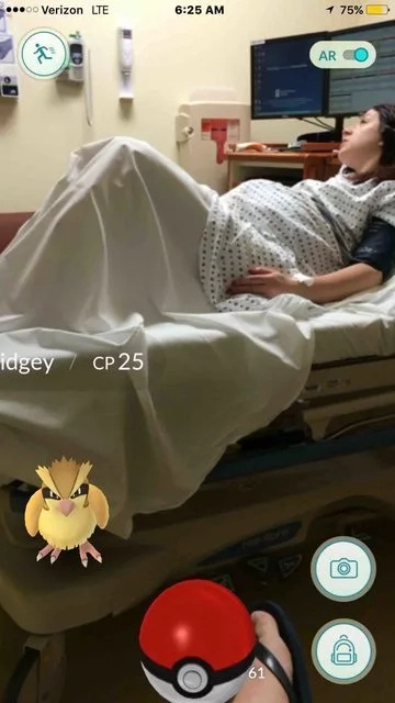A pokemon was sitting on his wife's hospital bed while she was in labor!