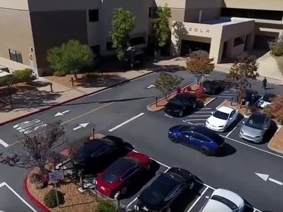 Hi-Tech Tesla Car Drives Owner To Work And Finds A Parking Spot
