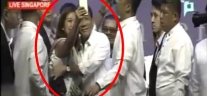 Hot Duterte gives woman in Singapore a tight embrace and she has now fallen head-over-heels
