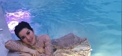 Biglaang photoshoot! Kris Aquino dips in a pool in her gown