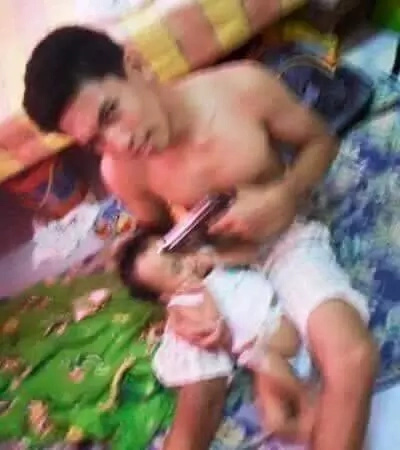 Netizens bash father for outrageous 'gunpoint' photo Netizens bash father for outrageous 'gunpoint' photo