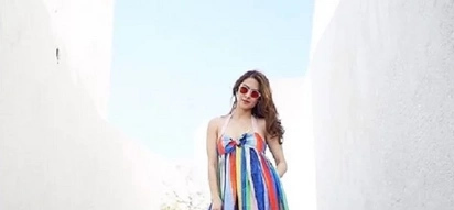 Marian Rivera’s colorful OOTD stands out in the white city of Santorini in Greece