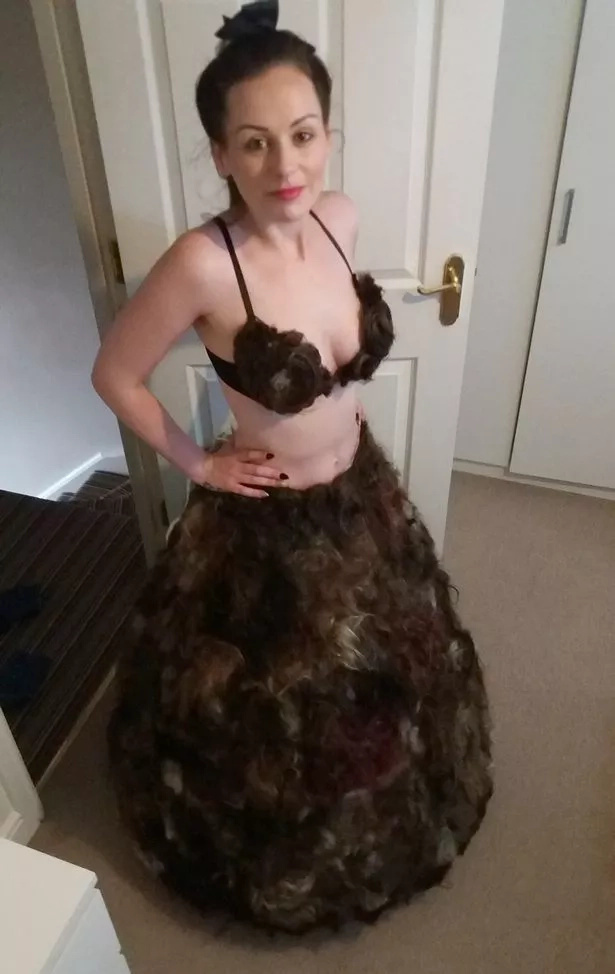 Designer creates dress out of pubic hair Designer creates dress out of pubic hair