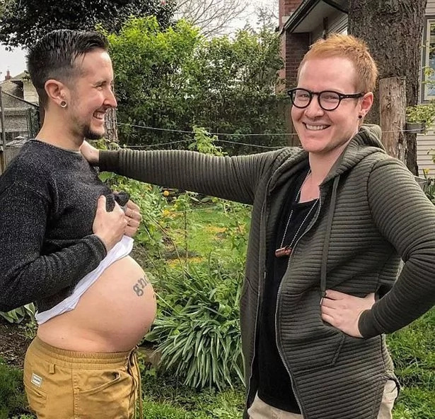 These 2 men are heavily pregnant and expecting their first biological son