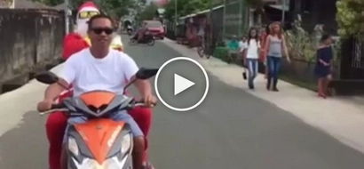 Pinoy Santa Claus suffers embarrassing accident while riding motorcycle during Christmas