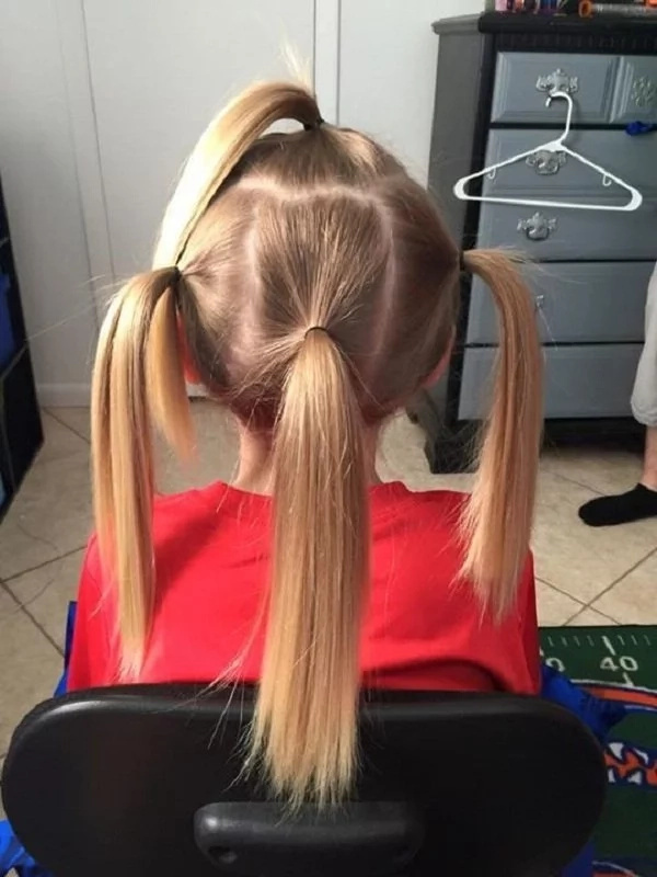 Hair tied in ponytails Hair tied in ponytails