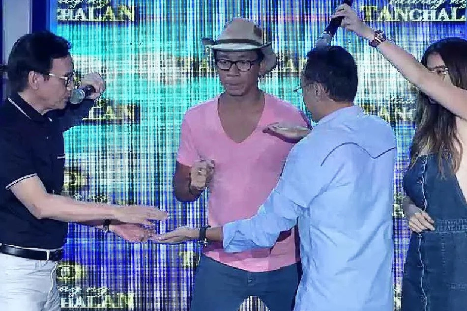 Louie Ocampo and Rey Valera enjoyed a game of Pak Ganern Louie Ocampo and Rey Valera enjoyed a game of Pak Ganern