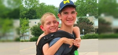 Teen carries brother with cerebral palsy 111 miles to raise awareness