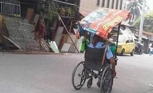 LOOK: Man with disability sells buko salad, photos went viral