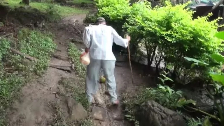 Old man walks miles to feed daughters Old man walks miles to feed daughters