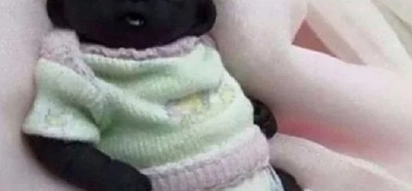 Shocking, but is he real? Meet the darkest baby in the world