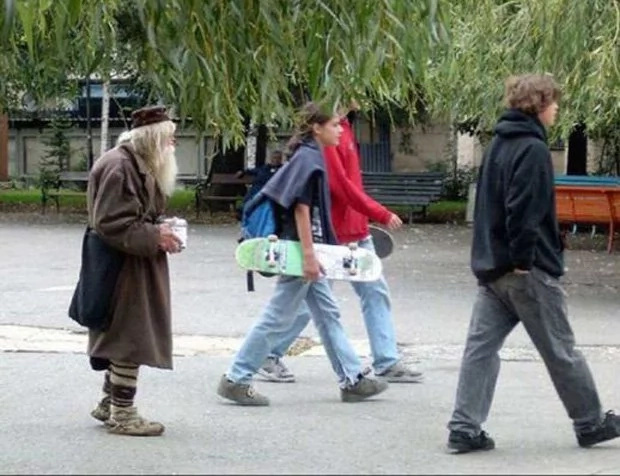 Old man begs for orphanages Old man begs for orphanages