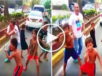 This Pinoy car passenger in Cebu danced with hilarious street children while stuck in heavy traffic!