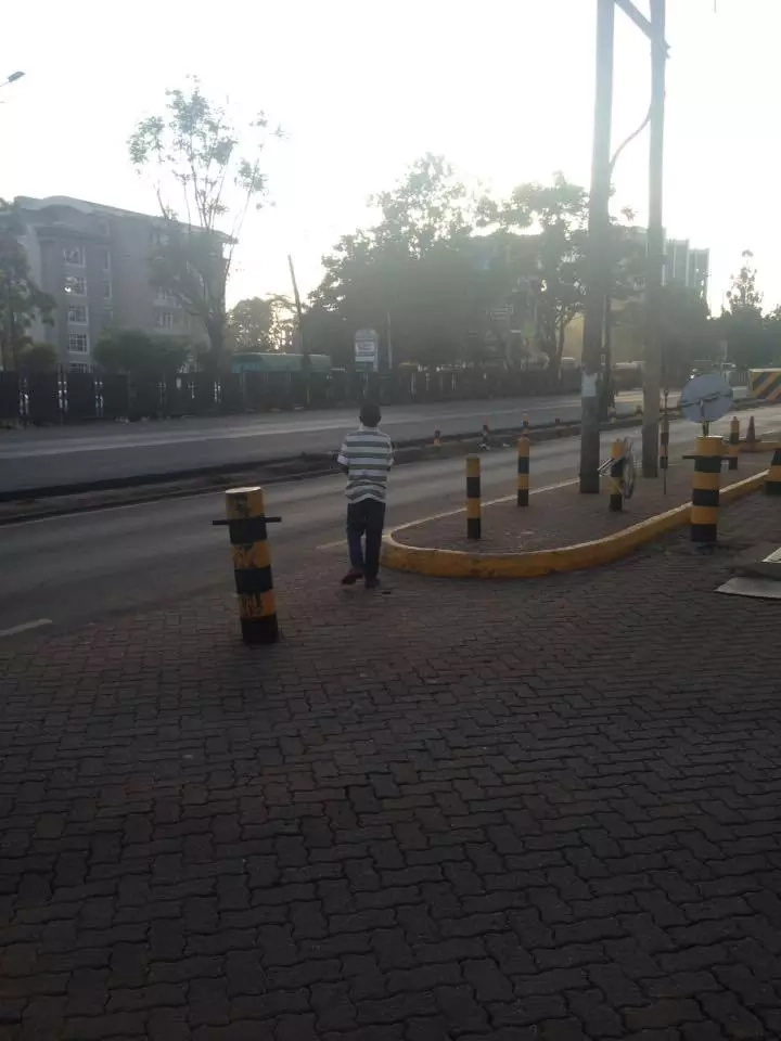 Woman saves child outside safaricom Woman saves child outside safaricom