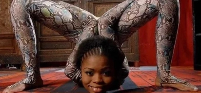 See why this girl is called the 'snake woman' (photos)