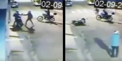 Off-duty policeman fights riding-in-tandem robbers Off-duty policeman fights riding-in-tandem robbers