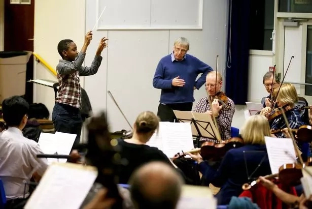 Child prodigy, 11, set to break world record of YOUNGEST orchestra conductor (photos, video)