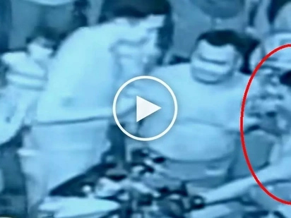 Drunken Pinoy cop fires his gun multiple times while partying in Tondo on New Year's Eve