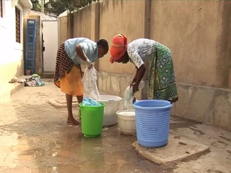 Sad story of university student washing clothes for a living