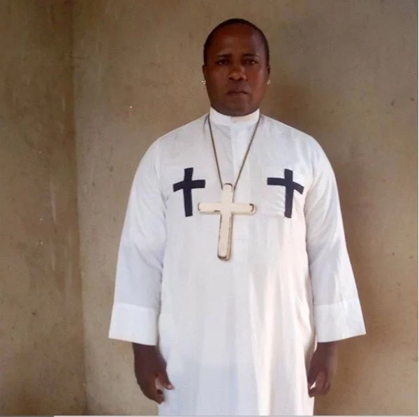 Tanzania’s self-styled prophet pictured kissing wife and house girl arrested