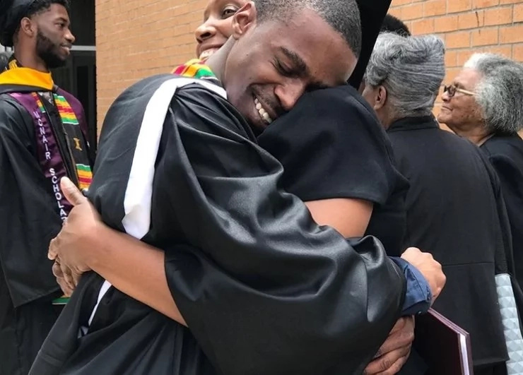 This young man credits his mother for special success in his life This young man credits his mother for special success in his life