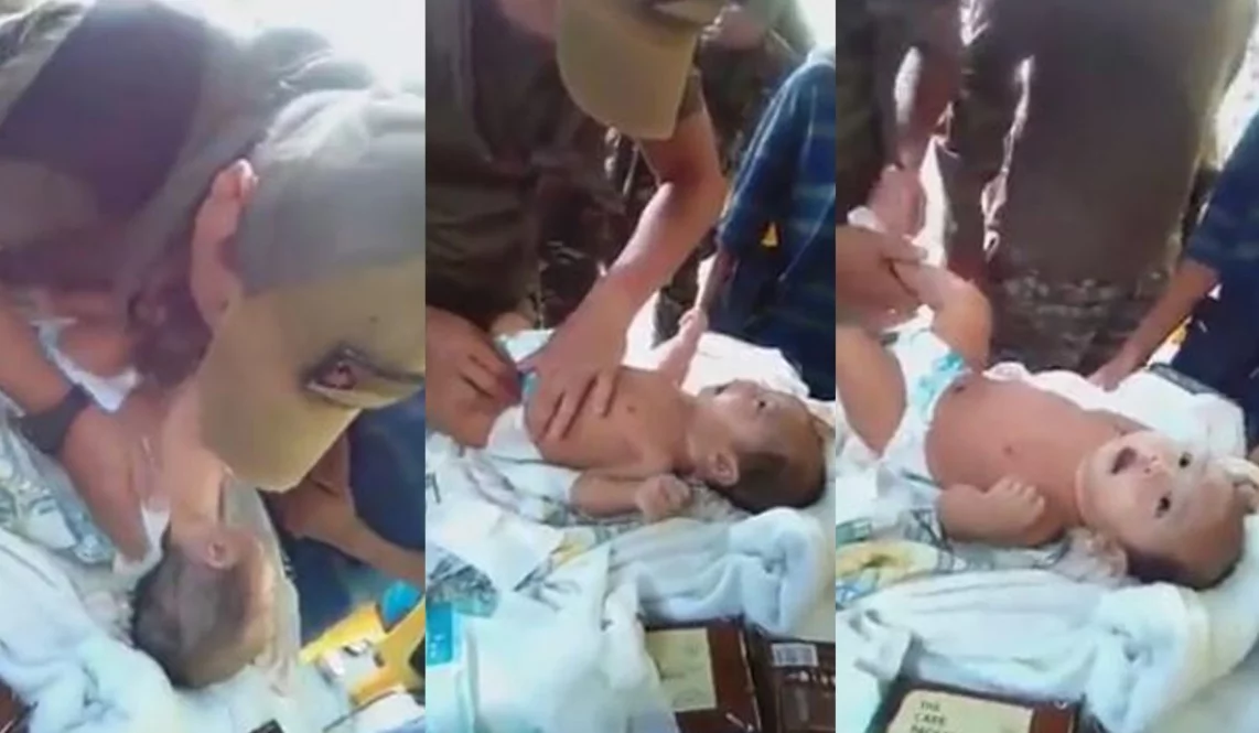 Watch this tough soldier gently perform a medical treatment for this 2 month old baby Watch this tough soldier gently perform a medical treatment for this 2 month old baby