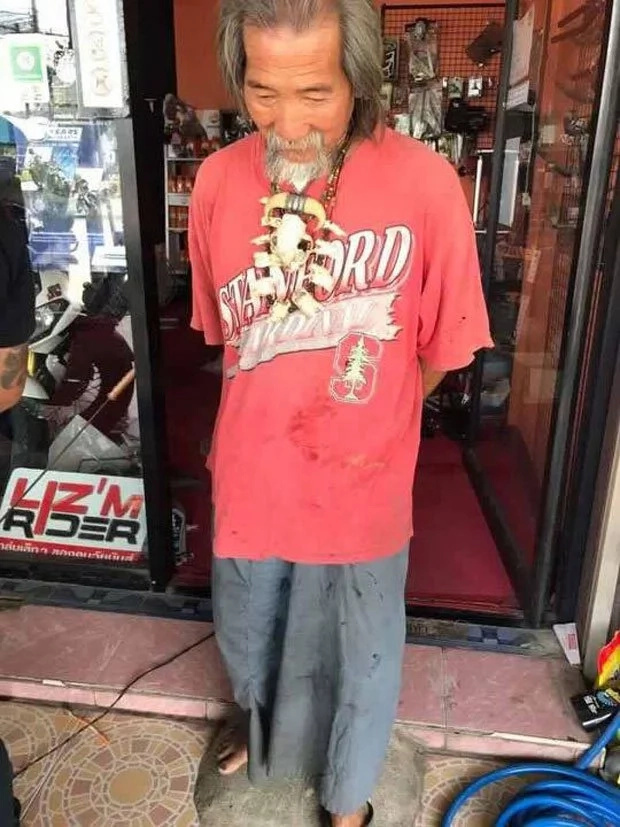 Rich man in tattered clothing buys Harley Davidson in cash Rich man in tattered clothing buys Harley Davidson in cash