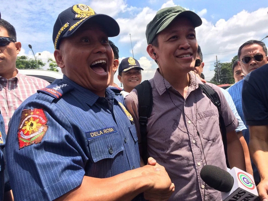 Bato all smiles as he shook hands with Bayan leader Bato all smiles as he shook hands with Bayan leader