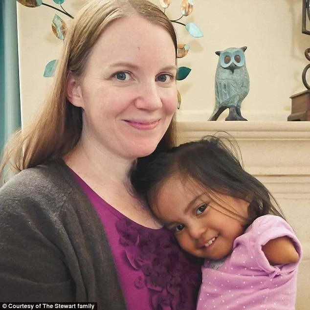 Adrienne Stewart with her adopted daughter, Maria. Photo: The Stewart Family Adrienne Stewart with her adopted daughter, Maria. Photo: The Stewart Family
