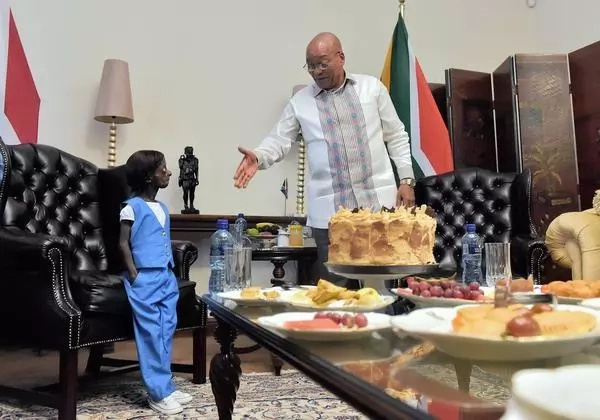 Girl trapped in body of aging pensioner celebrates 18th birthday with President (photos, video)