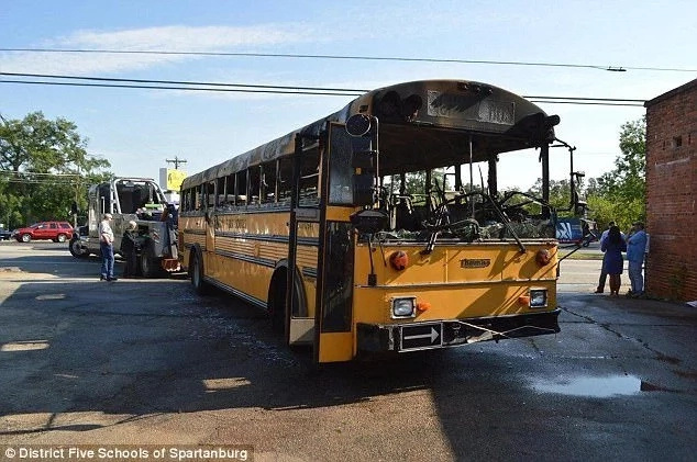 School bus driver evacuates 56 students from bus just before it bursts into flames School bus driver evacuates 56 students from bus just before it bursts into flames