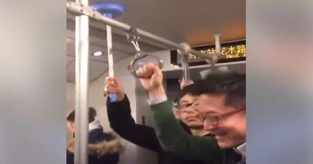 Chinese guy uses toilet pump as handrail Chinese guy uses toilet pump as handrail